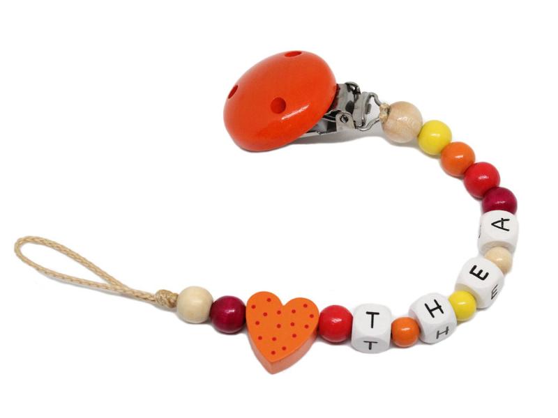 Schnullerkette mit Namen Tupfenherz orange