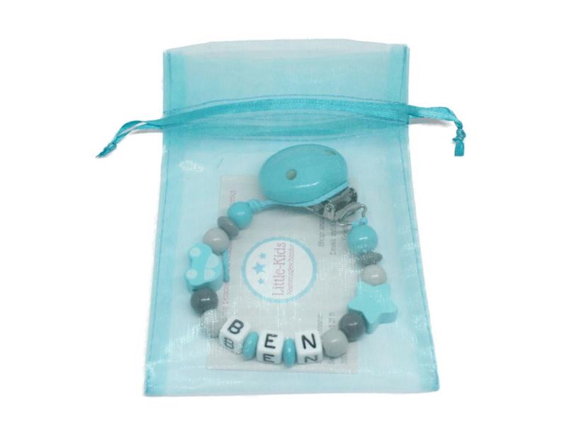 Schnullerkette mit Namen Auto + Stern türkis Verpackung