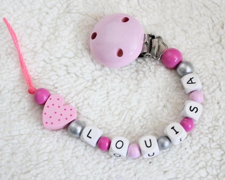 Schnullerkette mit Namen Tupfenherz rosa
