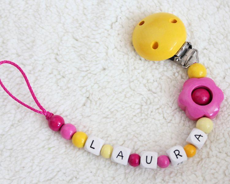 Schnullerkette mit Namen Blume gelb/pink