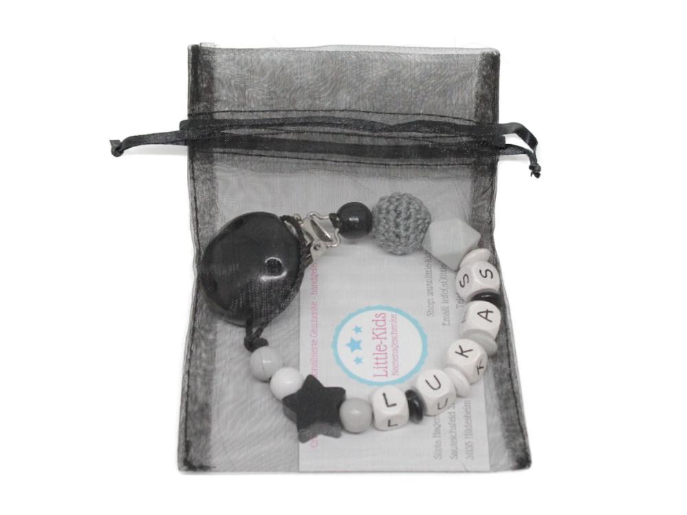 Schnullerkette mit Namen Stern + Hexagon schwarz Verpackung