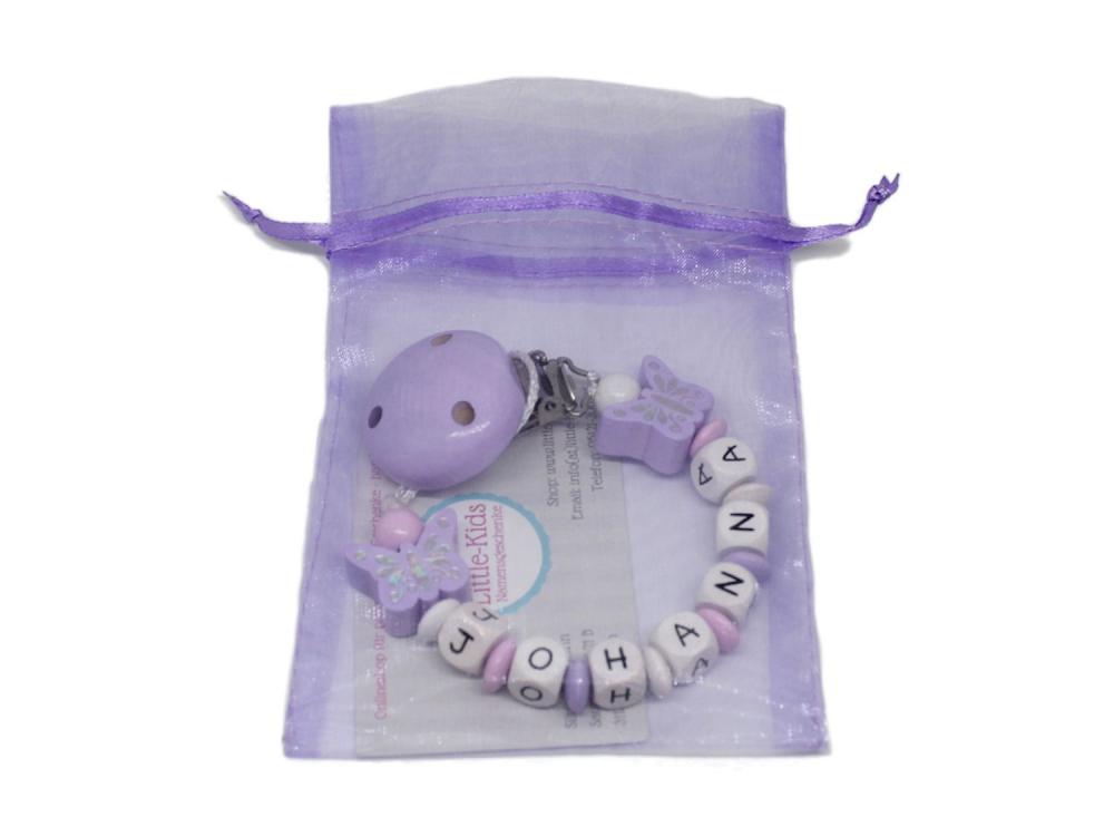 Schnullerkette mit Namen Glitzerschmetterling flieder Verpackung